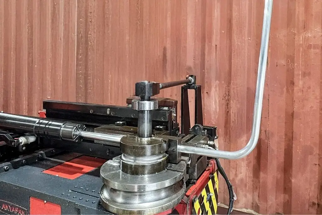 Probend's bending head with a freshly bent aluminium tube in the Invercargill workshop